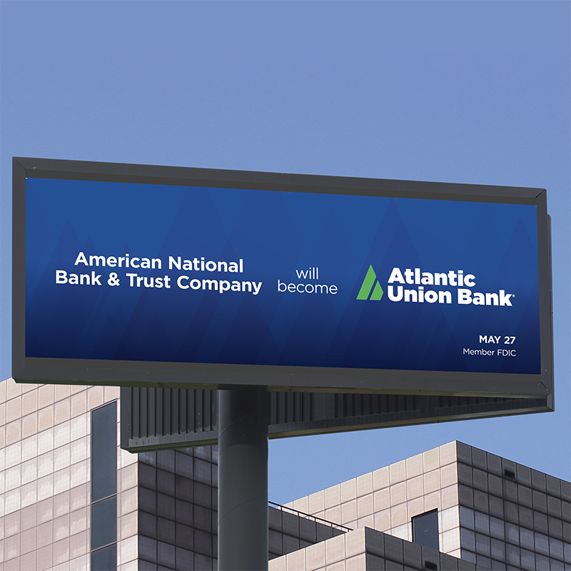 Photo mockup of a billboard that says "American National Bank & Trust Company will become Atlantic Union Bank."
