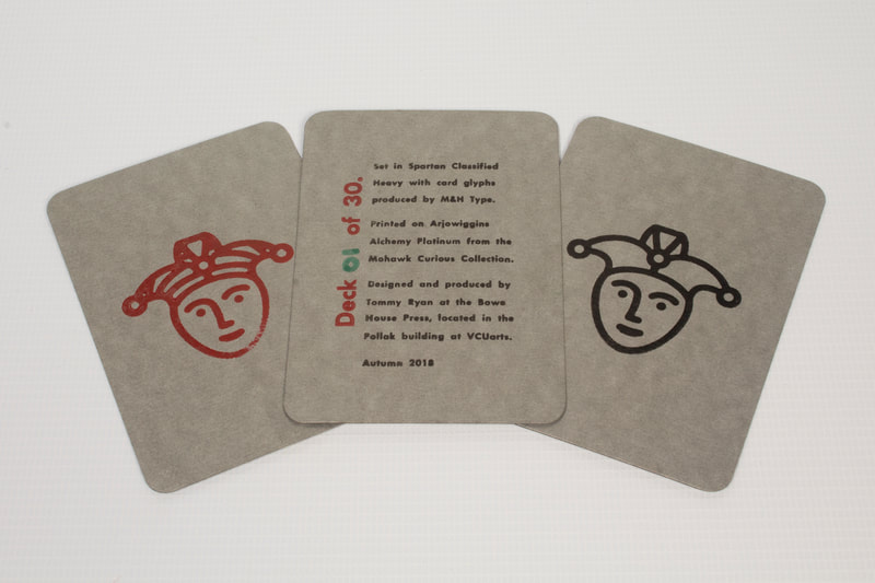 Photo of handmade playing cards with two jokers and a colophon